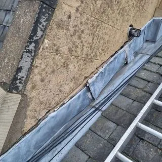 Back to basics with this failing leadwork ⬅️ ⬅️swipe for finished article.
We opted to use the original raggle for this one to try not to interfere with the existing render. 

#roofingspecialists #hallmark #roof #leadwork #leith #edinburgh #edinburghclicks #lead #roofingculture #architect #slate #scotlandtrustedtrader #edinburghtrustedtrader #nfrc
